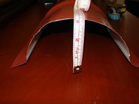 Roll formed roof ridge cap